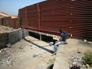Border wall over a drainage culvert